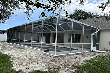 White mansard style pool enclosure by East Coast Aluminum